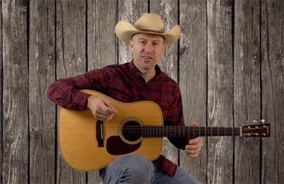long-haired-country-boy-guitar-lesson
